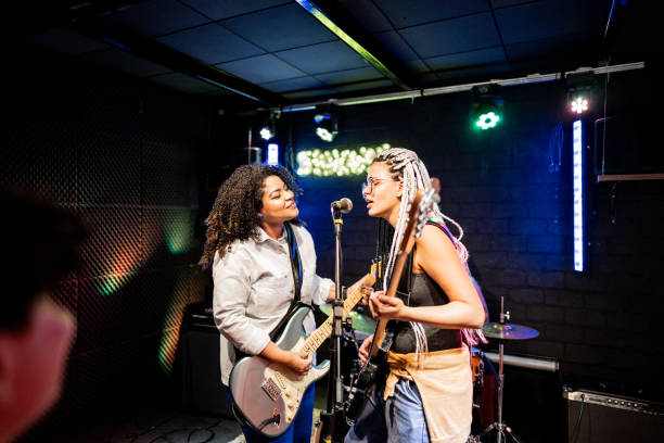 istock Musicians playing and singing on a show 1667994483
