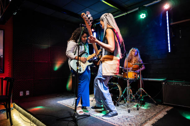 istock Musicians playing and singing on a show 1667994487