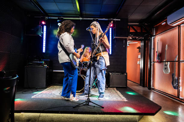 istock Musicians playing and singing on a show 1667994492