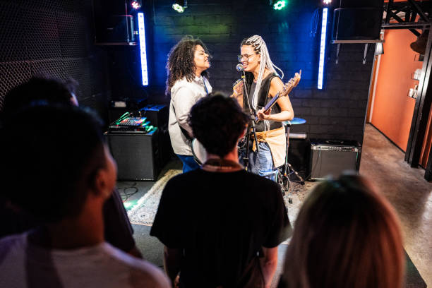 istock Musicians playing and singing on a show 1667994510