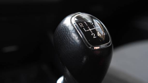 istock Driver Changing Gears with Manual Transmission Gear Stick 1668004869