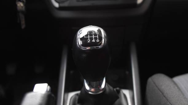 istock Driver Changing Gears with Manual Transmission Gear Stick 1668004872