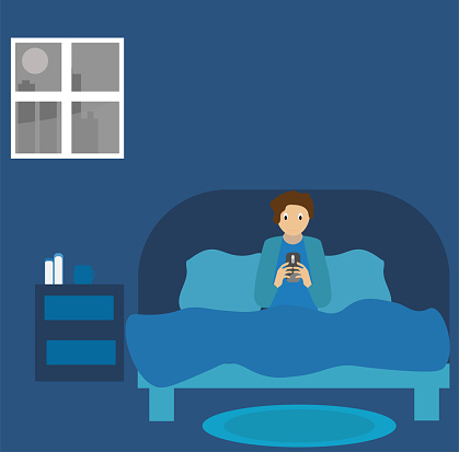 Smart Boy using smartphone lying on the bed at night. flat vector illustration.