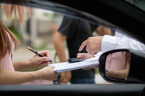 Insurance agents meet with customers when accidents occur to inspect damage and document insurance claims expeditiously. concept of car insurance agents to urgently inspect damage for customers.