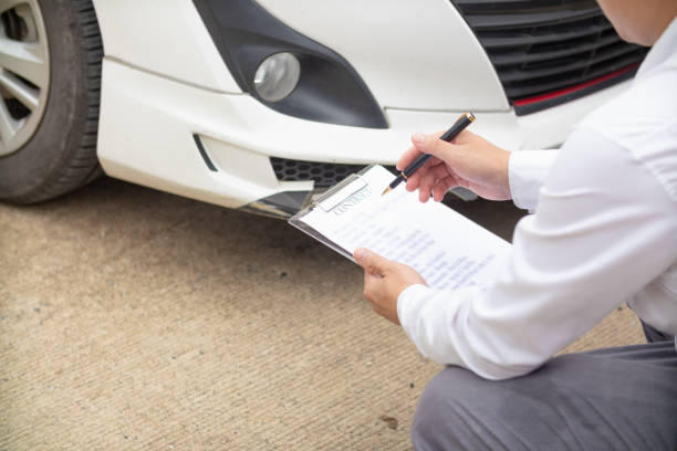 istock Insurance agents meet with customers when accidents occur to inspect damage and document insurance claims expeditiously. concept of car insurance agents to urgently inspect damage for customers. 1668069036