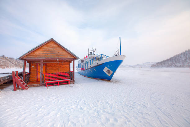 The Blue ship is surrounded by ice on Lake Baikal