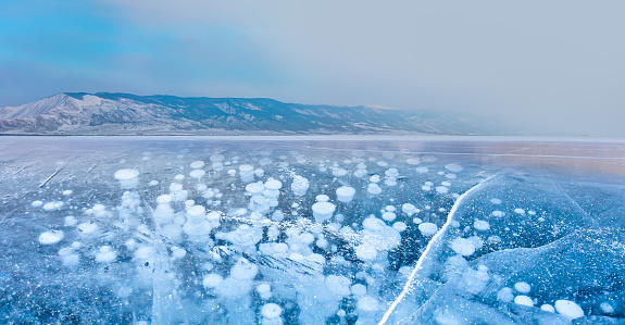 Bubbles of methane gas frozen into clear ice  - Lake Baikal, Russia