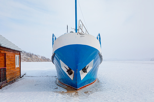 The Blue ship is surrounded by ice on Lake Baikal