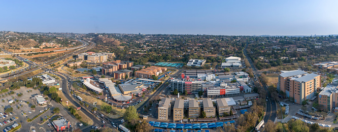 Panoramic of Roodepoort 14th Avenue intersection with N1 highway, showing Constantia Office Park, Hyperama Mall and other office blocks.