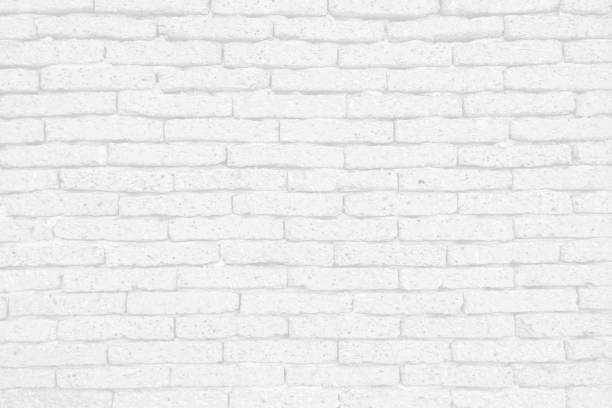 istock Empty old black and white (light gray)  grain stone brick wall made with blocks for abstract  background and texture. beautiful patterns, space for work,close up. 1668159032