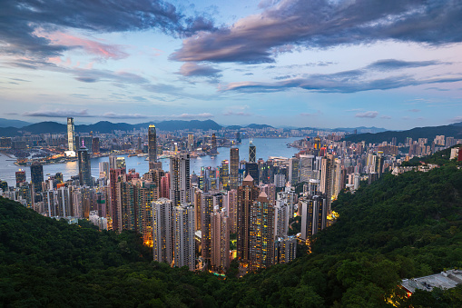 Hong Kong skyline modern cityscape view from the Victoria peak at blue hour. Amazing evening landscape of Hong Kong Special Administrative Region of the People's Republic of China