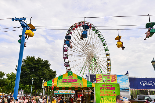 09/02/2023 - St Paul, Minnesota, USA; The Minnesota State Fair during the day. Sky Ride and Ferris Wheel