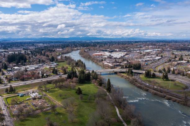 istock Aerial view of a freeway bridge crossing over a river in Eugene 1668194042