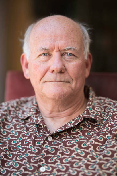 Portrait of a senior man at home - fotografia de stock