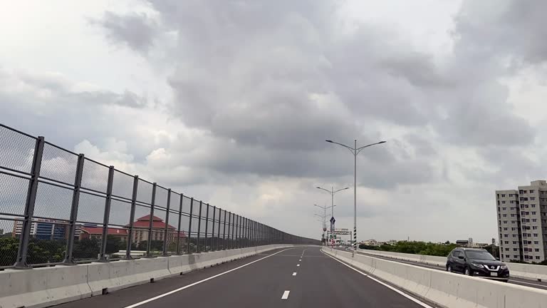 Time-lapse of Vehicle moving over Dhaka Elevated Expressway. Infrastructure Development of Bangladesh