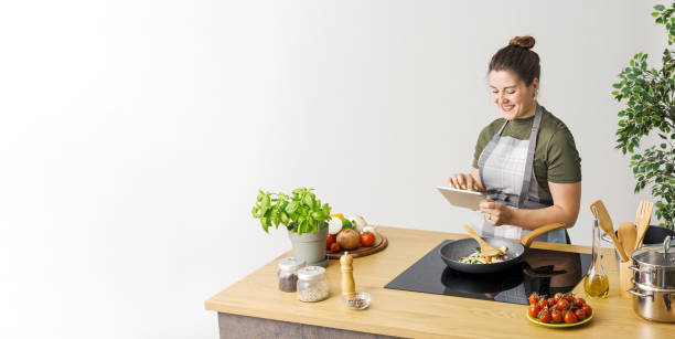 istock Woman searching for recipes online 1668245158