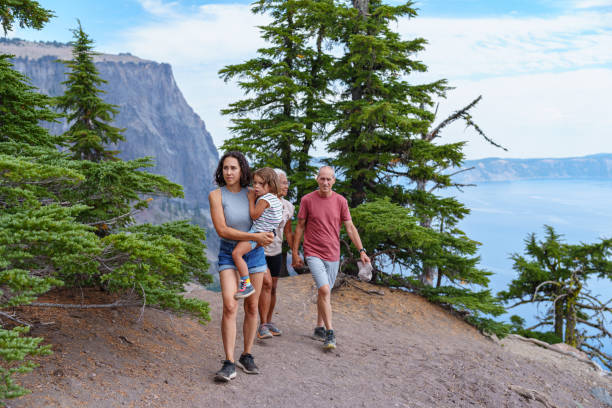istock Multigenerational family hikes along mountain ridge in Oregon 1668285412