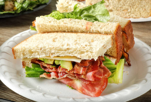 istock Bacon lettuce tomato and avocado sandwich on close up plate 1668296328