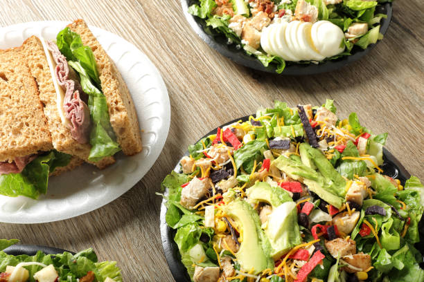 Green chicken salad bowls and roast beef sandwich