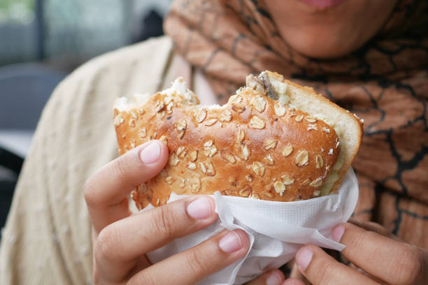 istock women hand holding beef burger 1668323143