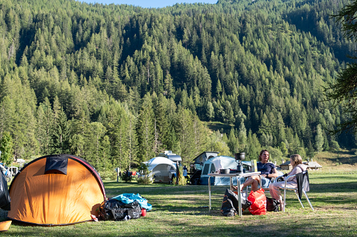 A lovely campsite situated in the foothills of the Mont Blanc mountains. Picturesque tented campsite in the foothills of the Mont Blanc Mountains in Italy.