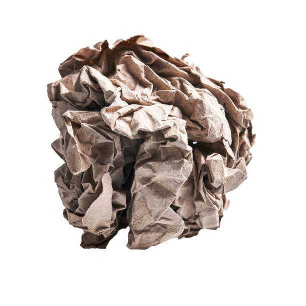 istock One brown crumpled paper ball over isolated white background 1668349931