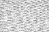 Knitted background.Texture of coarse horizontal knitting from white woolen threads