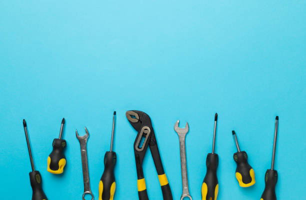 istock Set of tools on color background, top view 1668594012