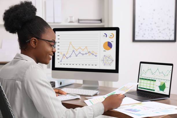 istock Professional accountant working at wooden desk in office 1668608022