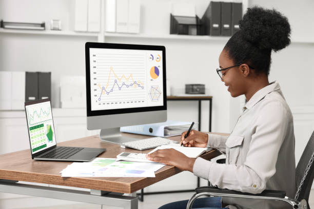 istock Professional accountant working at wooden desk in office 1668608023