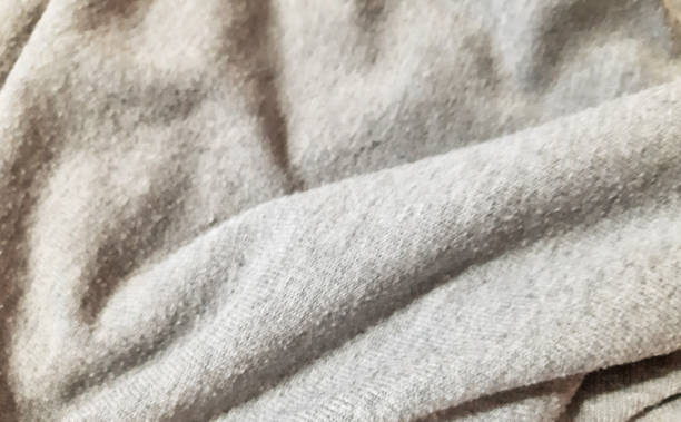 istock Gray light warm knitted material. Background design, photography. Textile, fabric template,  modern 1668649901