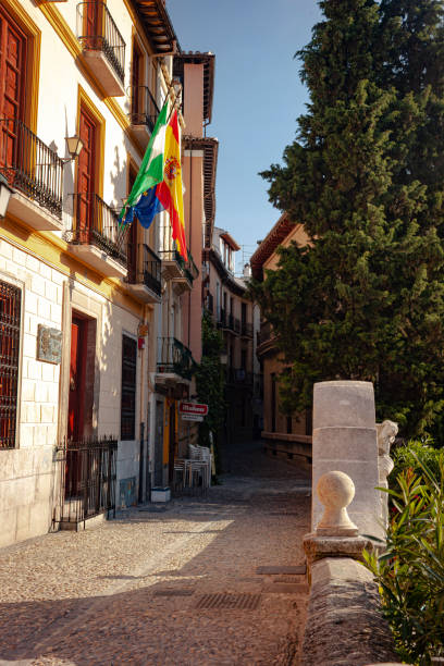 The streets of Grenada with trees on one side stock photo