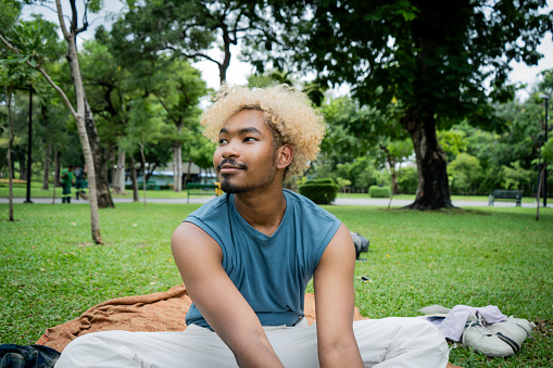 A gender fluid, non-binary freelance dancer in Thailand