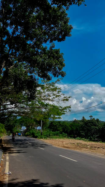 istock Blue sky on the street 1668977709