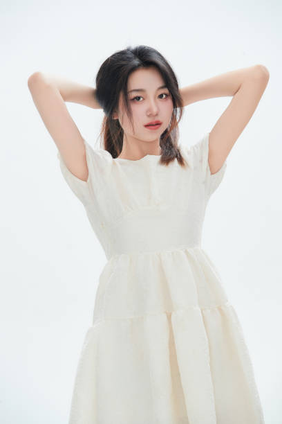 istock A Chinese female college student against a white background 1668987707