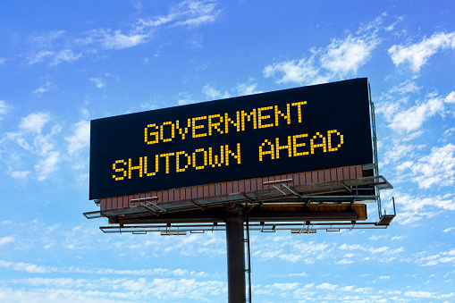 An electronic highway billboard with government shutdown ahead warning