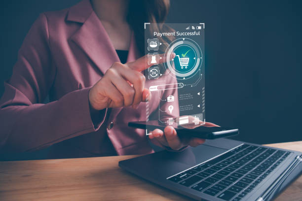 istock Woman using smartphone online payment with icons on virtual screen, mobile banking and online shopping. Technology online banking applications via. Digital online payment, financial transaction. 1669075302