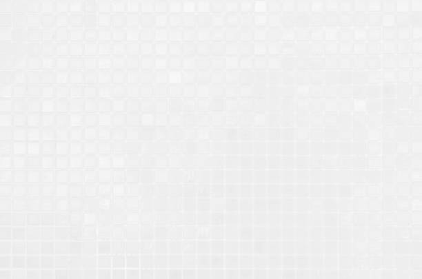 istock White tile wall chequered background bathroom texture. Ceramic brick wall and floor tiles mosaic background in bathroom and kitchen clean. Design pattern geometric with grid wallpaper decoration. 1669084147