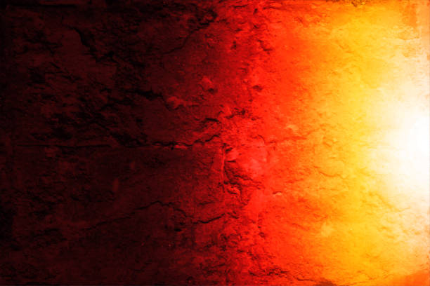 istock A vibrant bright yellow orange coloured smudged abstract fierce fire over dark red or maroon black gradient colored abstract horizontal fiery vector cracked textured effect 3D backgrounds like volcano lava or nebula art or painting 1669134265