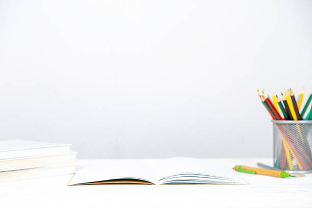 istock Pencils and books on the table. Concept teacher's day, study, reading, literature, development. 1669134672
