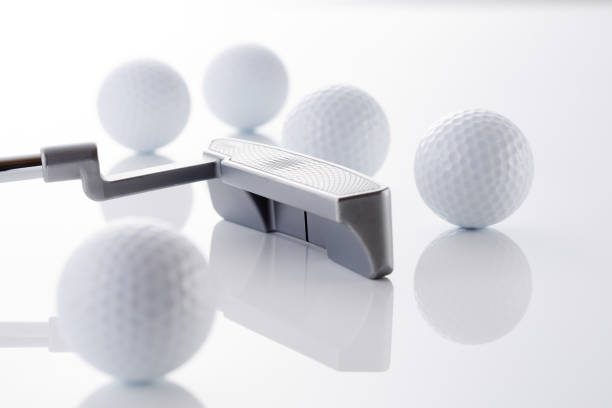 istock golf image. golf balls and golf clubs 1669135392