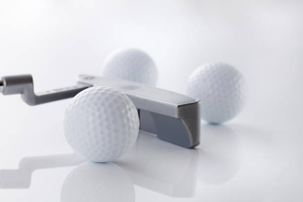 istock golf image. golf balls and golf clubs 1669135426