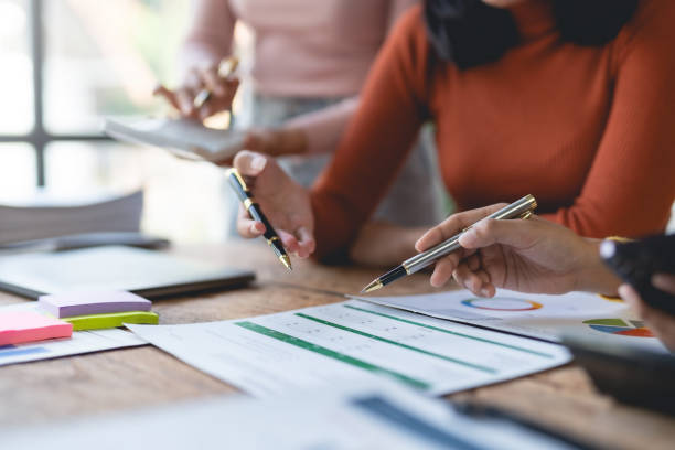 istock Business people meeting explaining the financial graph data and marketing plan. 1669145670
