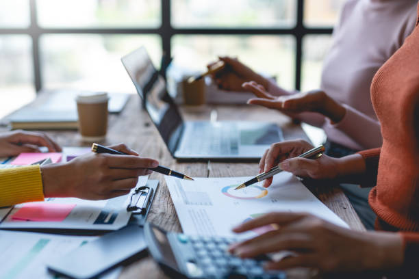 istock Business people meeting explaining the financial graph data and marketing plan. 1669183484