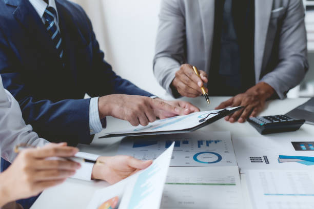 istock Business people meeting explaining the financial graph data and marketing plan. 1669183493