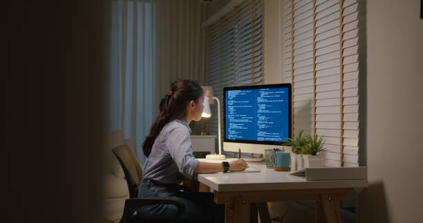 istock New possible digital transformation future workforce. Asia people young talent woman busy work late night at home office reskill upskill martech job remote test on AI cloud computing cyber security. 1669220895