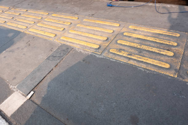 istock Yellow tactile paving for blind people 1669341316