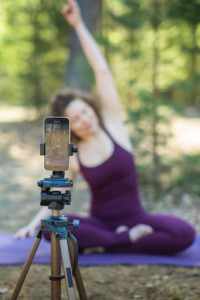 istock Close-up of a phone while doing yoga 1669352388