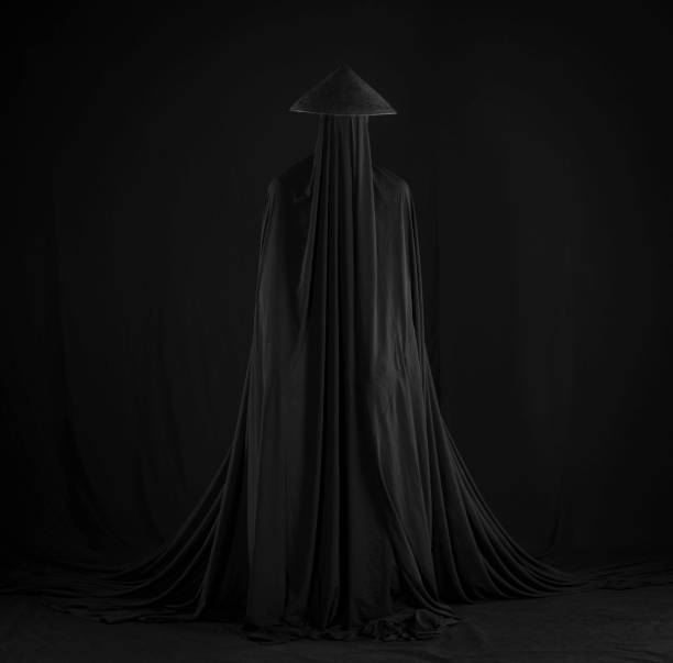 istock monster samurai in a black cloak on a black background 1669364204