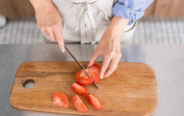 istock A woman is cooking. 1669477385